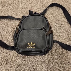 Adidas Mini Black Backpack with Gold Accents